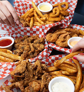 Fries, chicken tenders, fried shrimp, fried calamari, fried oysters